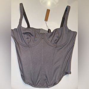 Brand new SKIMS Charcoal Cotton Corset top. Never been worn. Size Large.